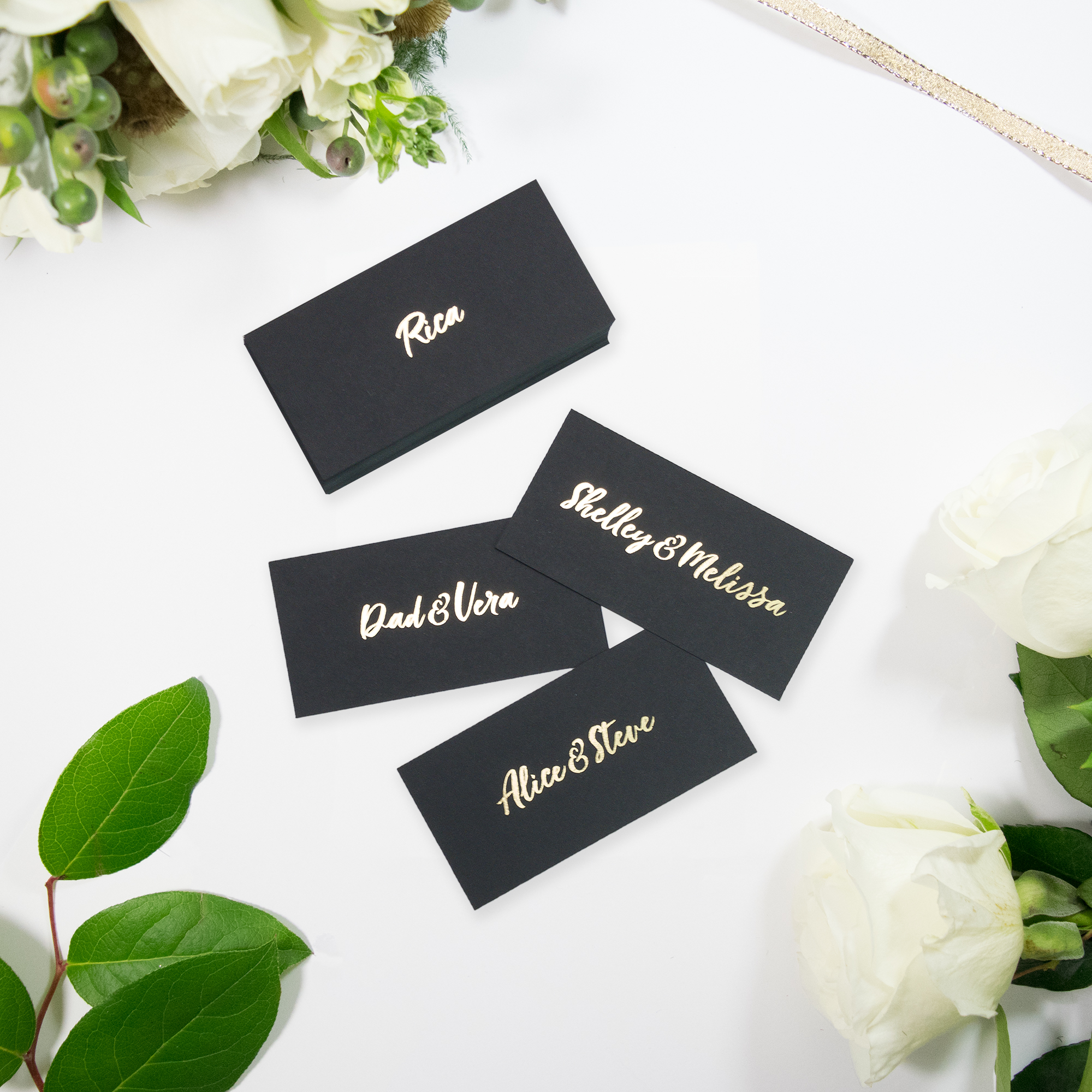 black and gold place cards