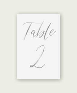 A modern silver foil table number