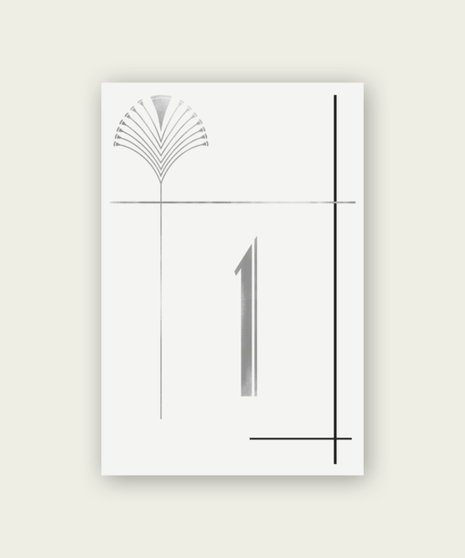 A silver and black art deco table number